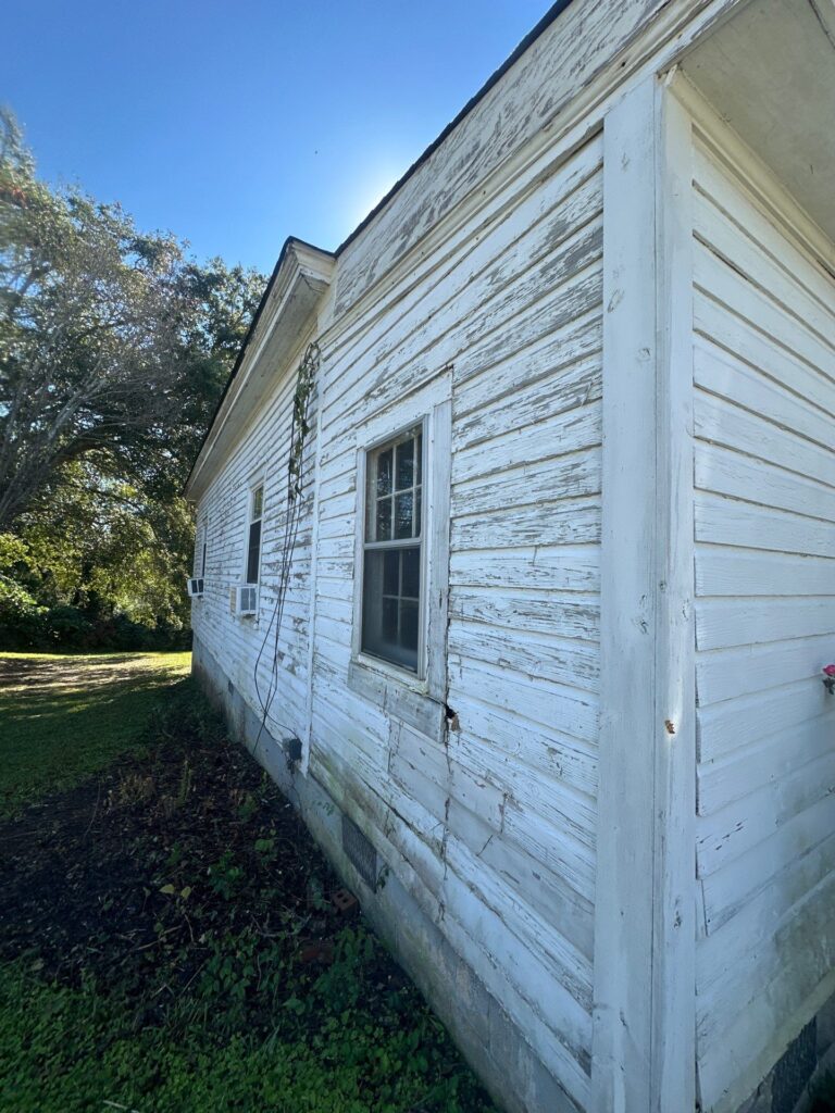 the service being done is house washing to remove dirt and mildew from the exterior wood siding